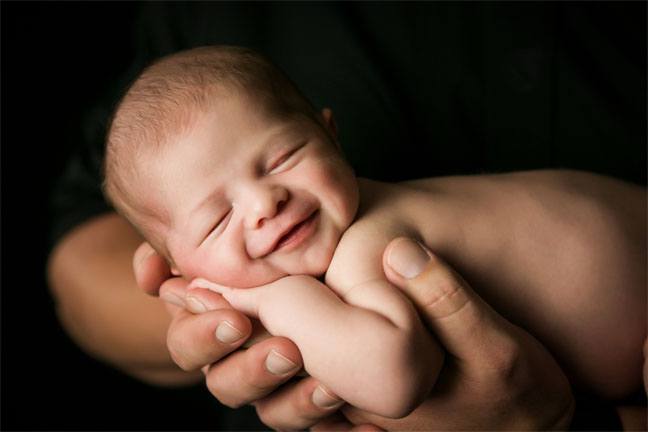 Baby in Mom or Dad's Hands